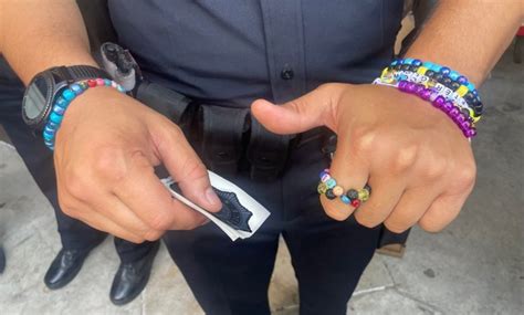 Law enforcement trade Taylor Swift friendship bracelets at Denver Eras Tour stop